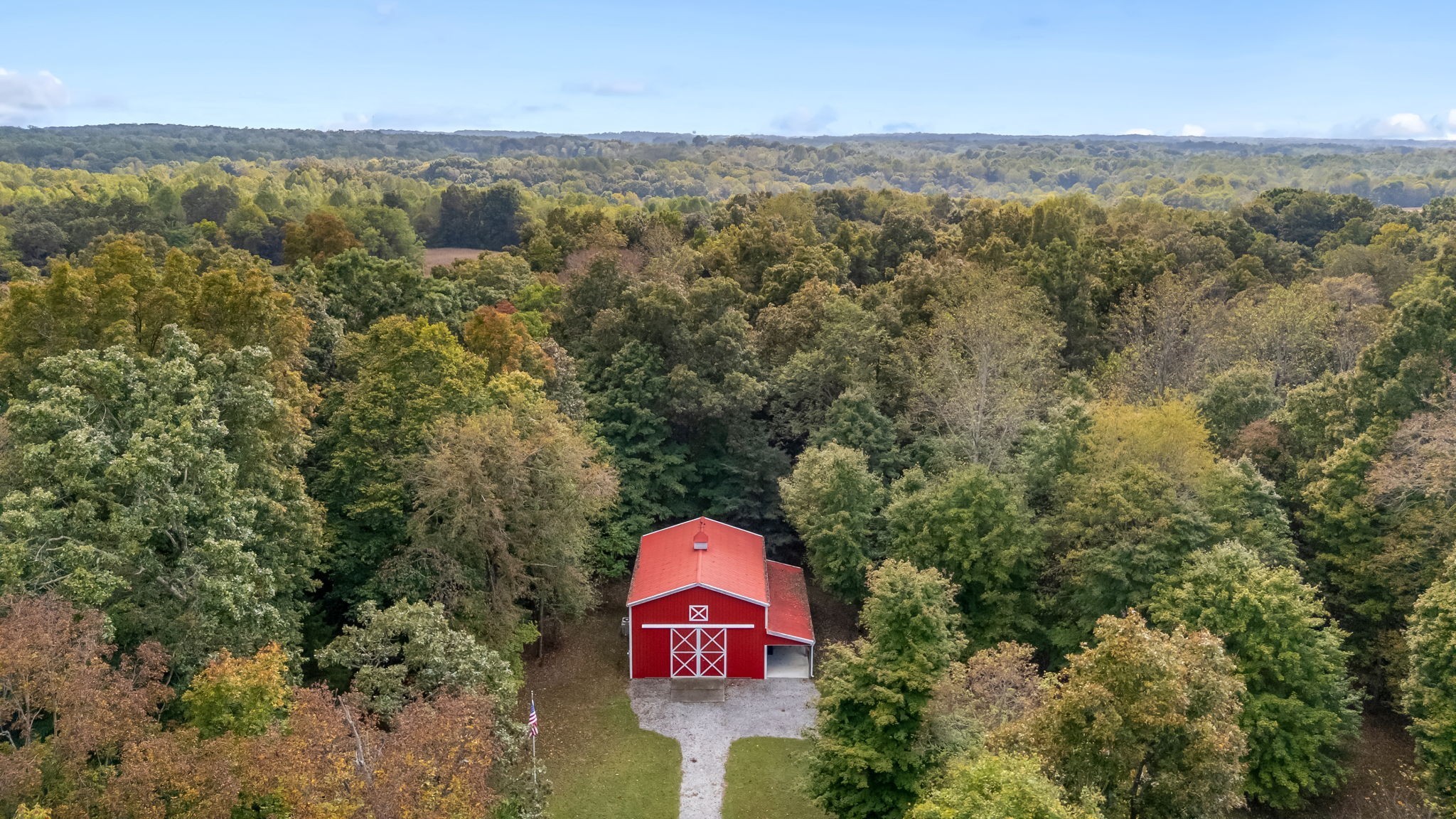 5756 Burgess Gower Road Pleasant View, TN 37146 - Photo 7 of 67 a view of a city with lush green forest