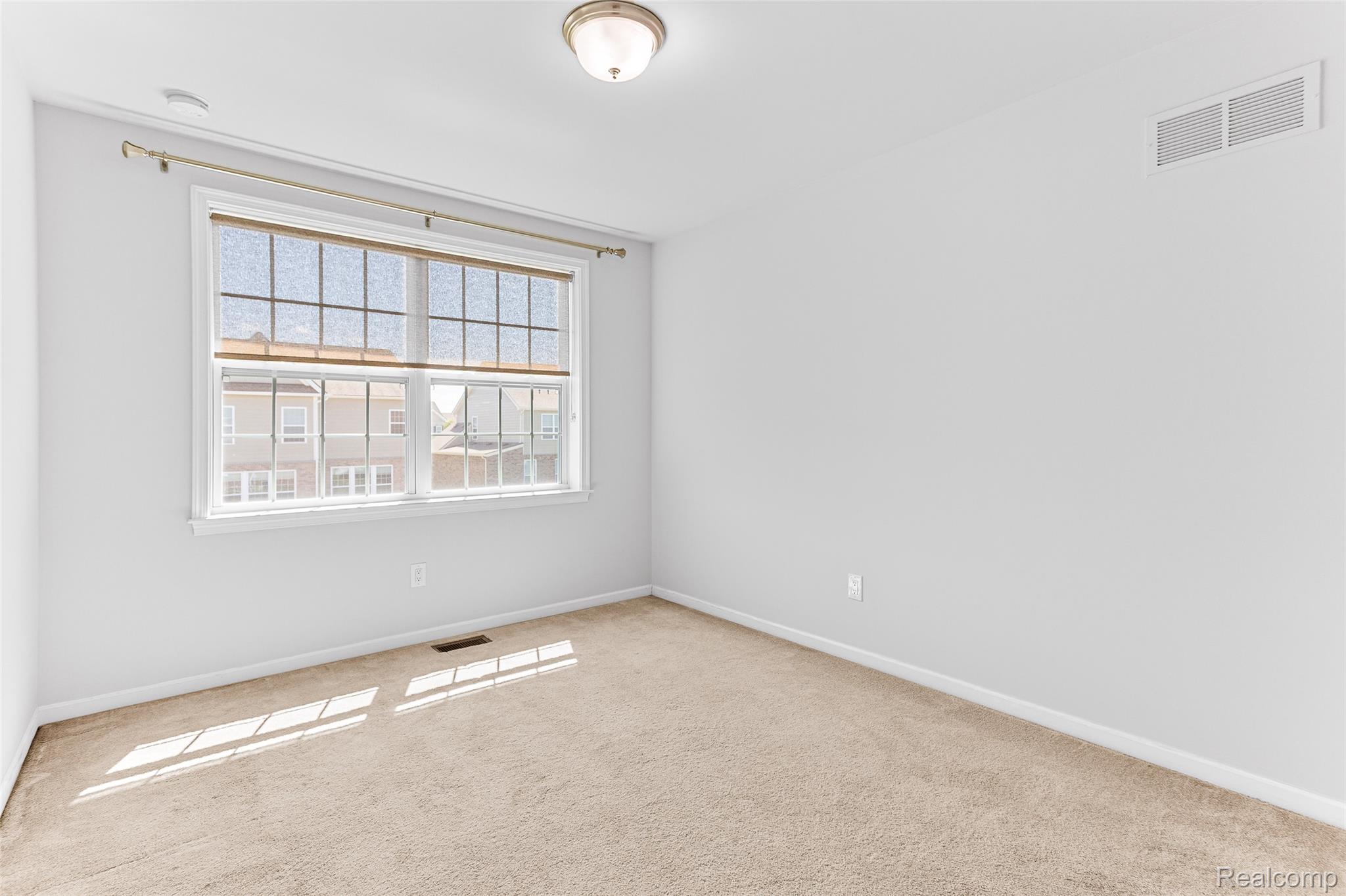 50873 Scarborough Road Canton, MI 48188 - Photo 13 of 25 Neutral wall color, wall-to-wall carpeting, and a flush mount ceiling light fixture