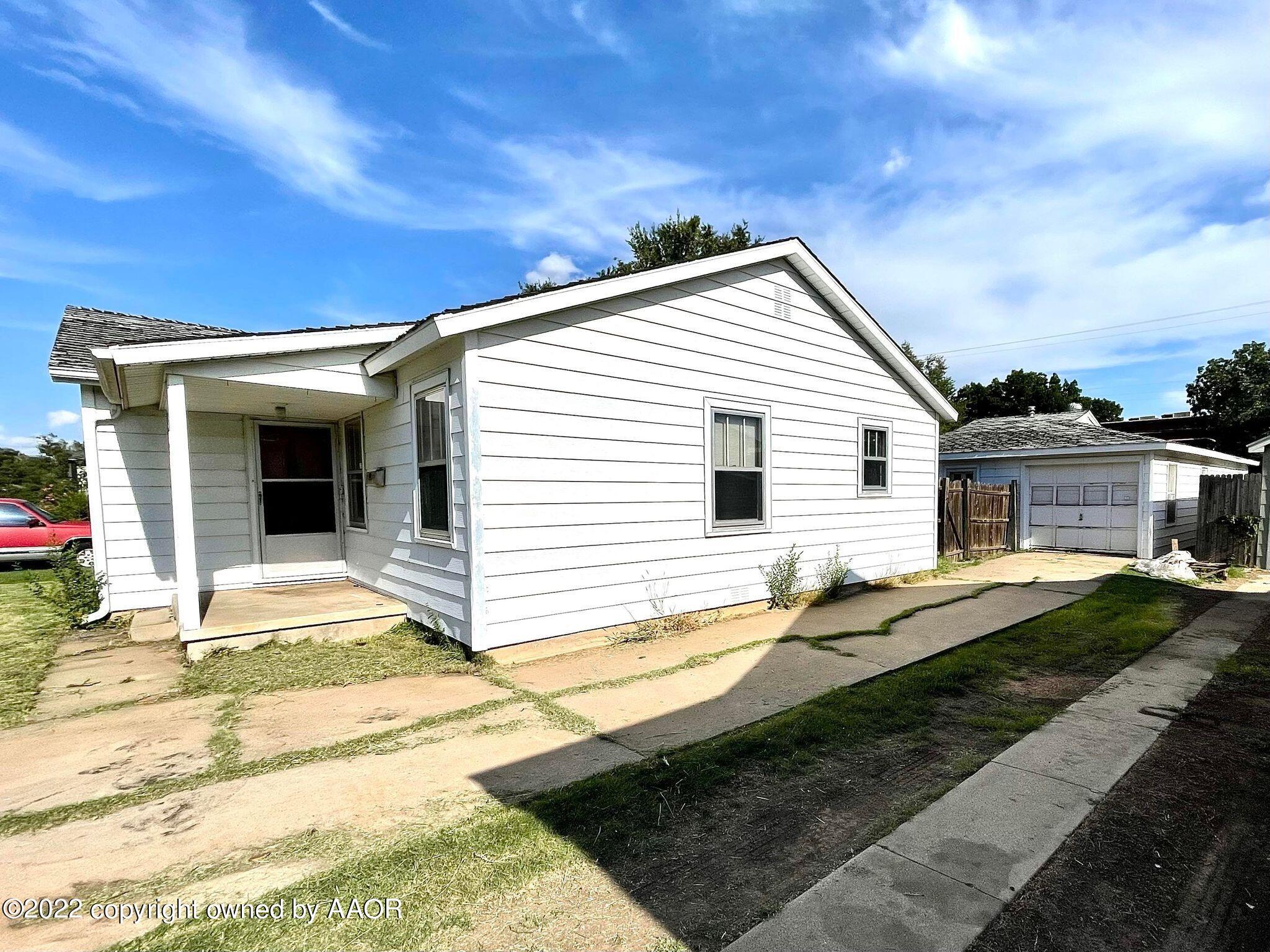 702 Sunset Terrace Amarillo, TX 79106 - Photo 2 of 21 a view of a house with a patio