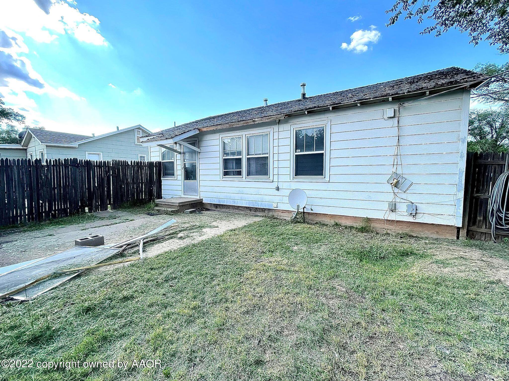702 Sunset Terrace Amarillo, TX 79106 - Photo 3 of 21 a view of a house with a yard