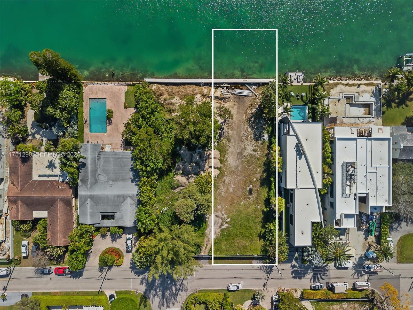 700 88th Street Surfside, FL 33154 - Photo 5 of 8 an aerial view of multiple house