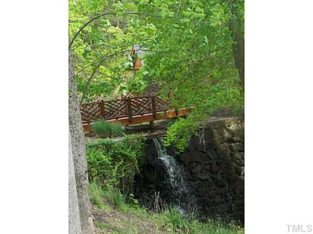 5305 Mill Dam Road Wake Forest, NC 27587 - Photo 25 of 25 Waterfall near Pond