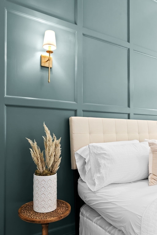 111 Killam Hill Road Boxford, MA 01921 - Photo 20 of 42 a living room with furniture and a potted plant