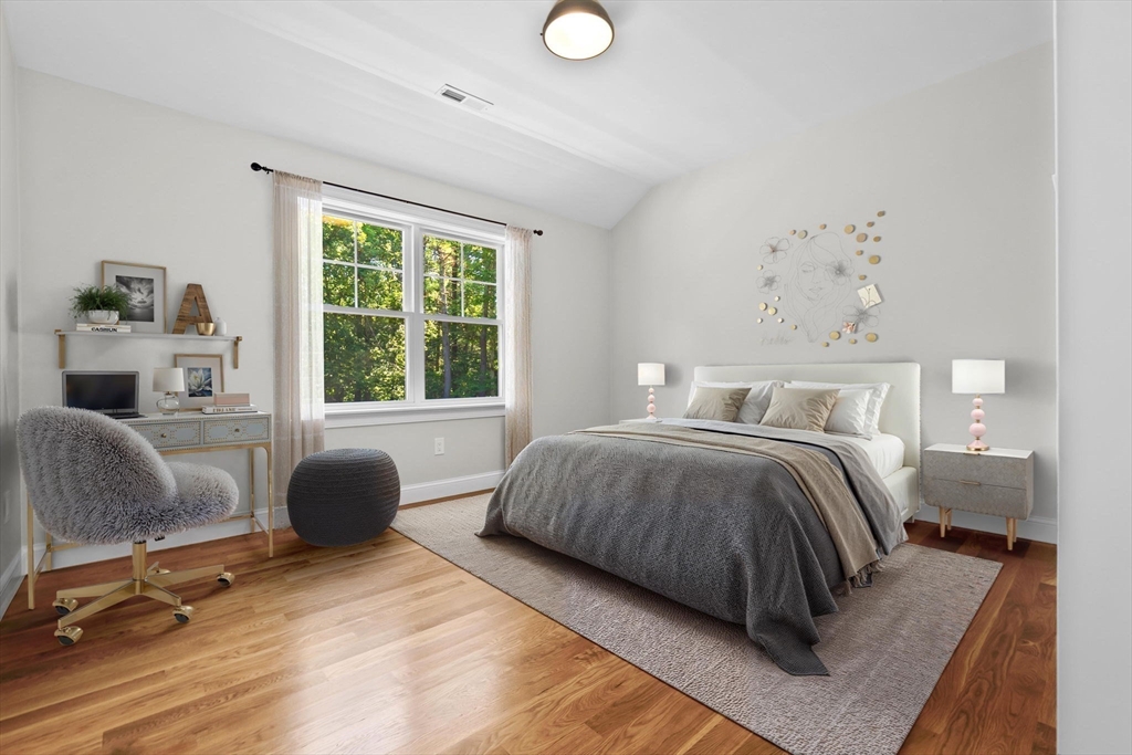 111 Killam Hill Road Boxford, MA 01921 - Photo 29 of 42 a bedroom with a bed and a couch