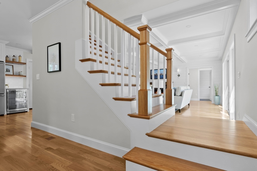 111 Killam Hill Road Boxford, MA 01921 - Photo 30 of 42 a view of an entryway with wooden floor and a living room