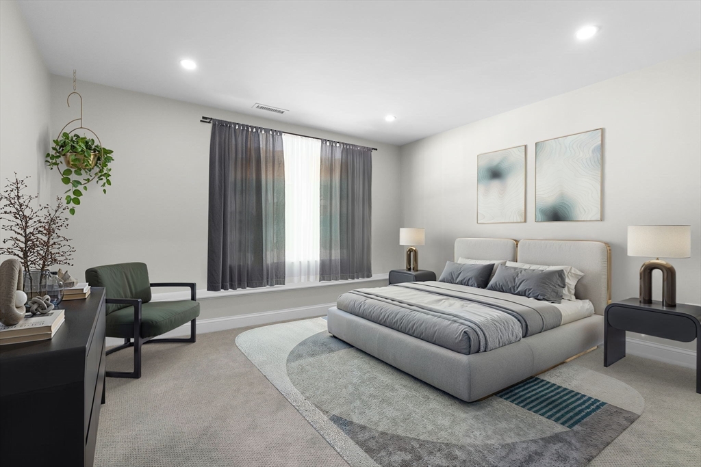 111 Killam Hill Road Boxford, MA 01921 - Photo 35 of 42 a spacious bedroom with a bed and a couch