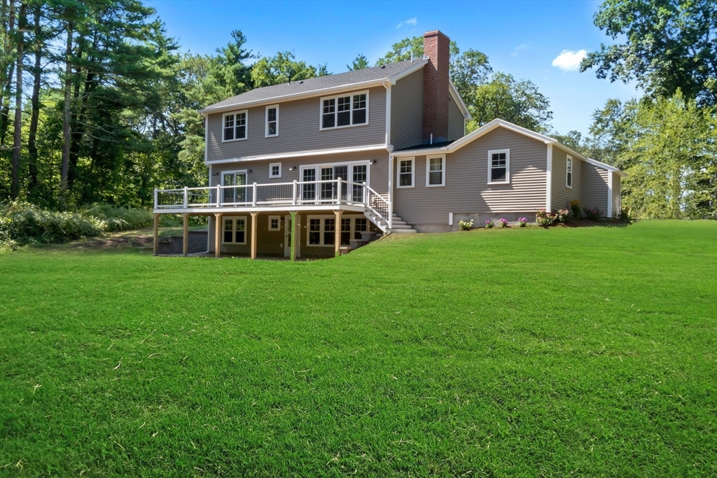 111 Killam Hill Road Boxford, MA 01921 - Photo 39 of 42 a front view of a house with a yard