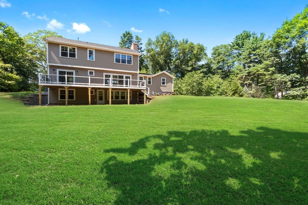 111 Killam Hill Road Boxford, MA 01921 - Photo 41 of 42 a view of a big house with a big yard and large trees