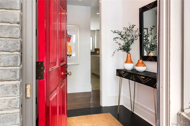 a view of a house with a tree