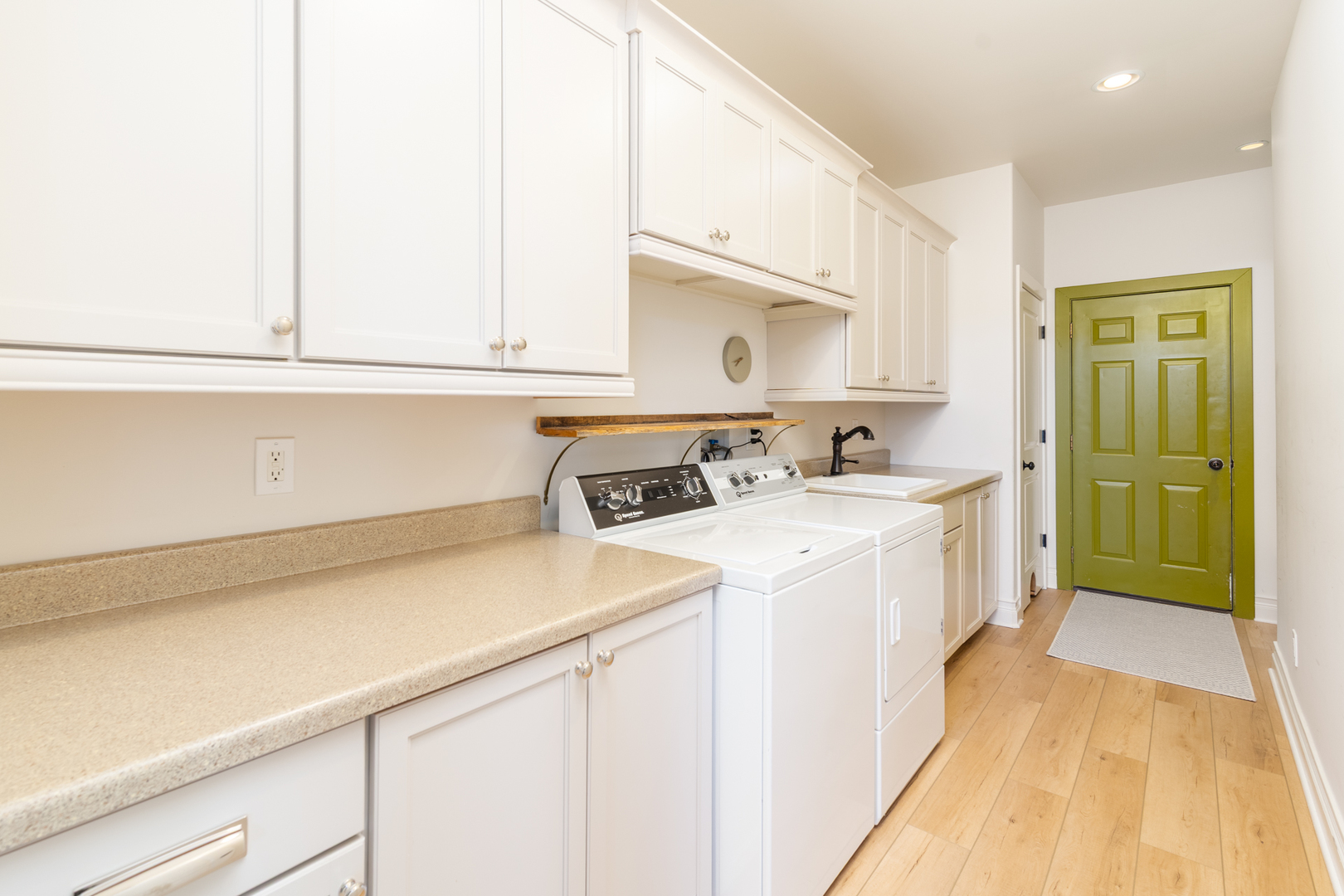 2138 East 550th Road Oglesby, IL 61348 - Photo 19 of 50 a view of a kitchen with sink dishwasher and wooden floor