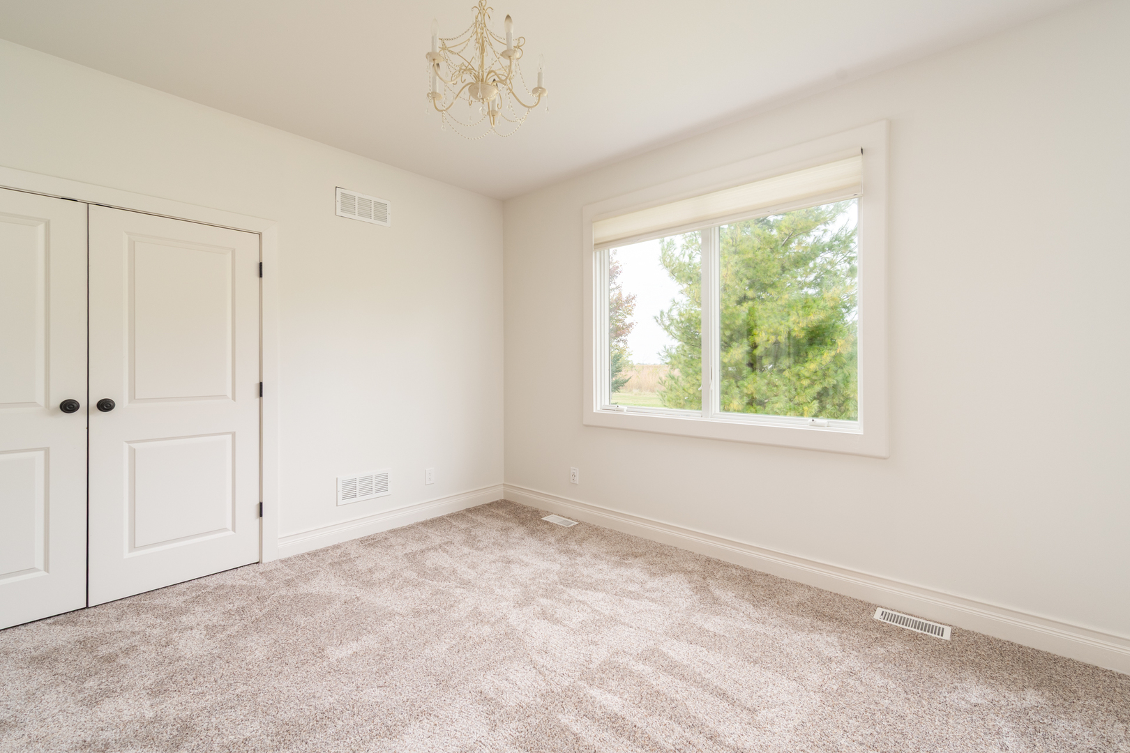 2138 East 550th Road Oglesby, IL 61348 - Photo 22 of 50 a view of an empty room with a window