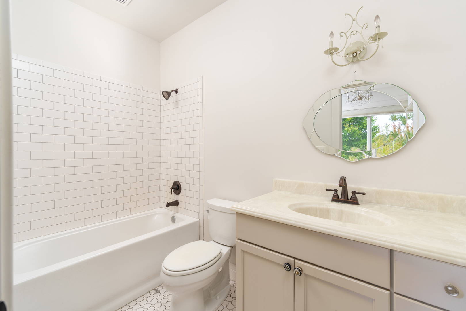 2138 East 550th Road Oglesby, IL 61348 - Photo 23 of 50 a bathroom with a sink a toilet and bathtub