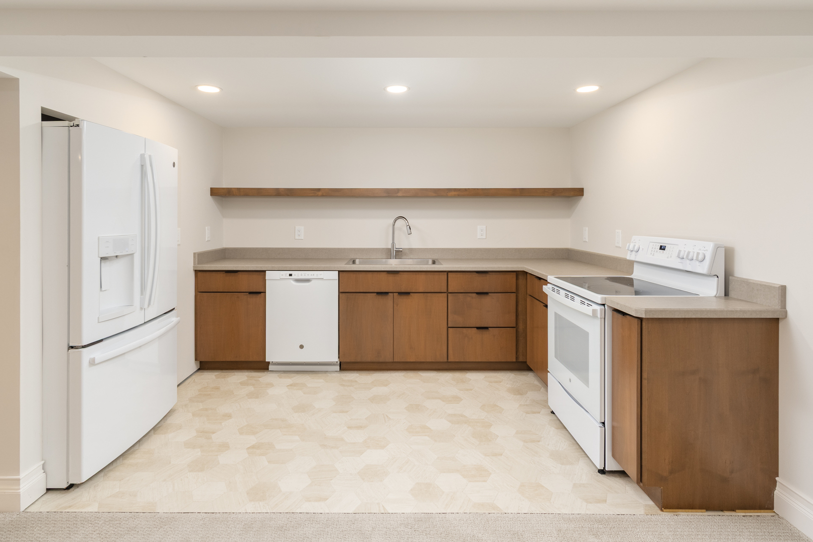 2138 East 550th Road Oglesby, IL 61348 - Photo 30 of 50 a kitchen with a sink stove and refrigerator