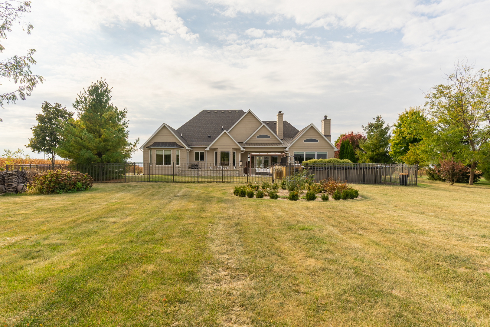 2138 East 550th Road Oglesby, IL 61348 - Photo 43 of 50 a view of a large house with a big yard and large trees