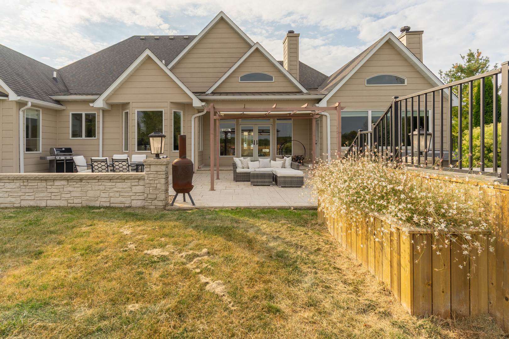 2138 East 550th Road Oglesby, IL 61348 - Photo 45 of 50 a view of a house with swimming pool and a porch with furniture