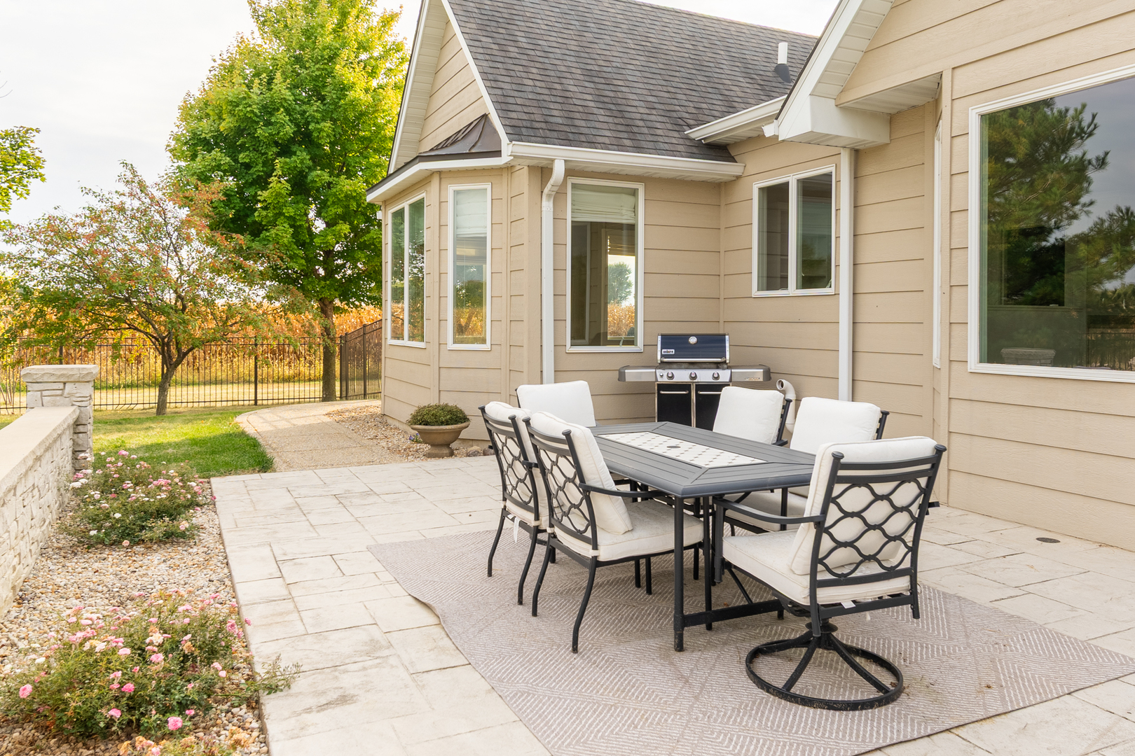 2138 East 550th Road Oglesby, IL 61348 - Photo 49 of 50 a view of a patio with table and chairs with wooden floor and fence