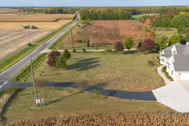 a view of a lake with a yard