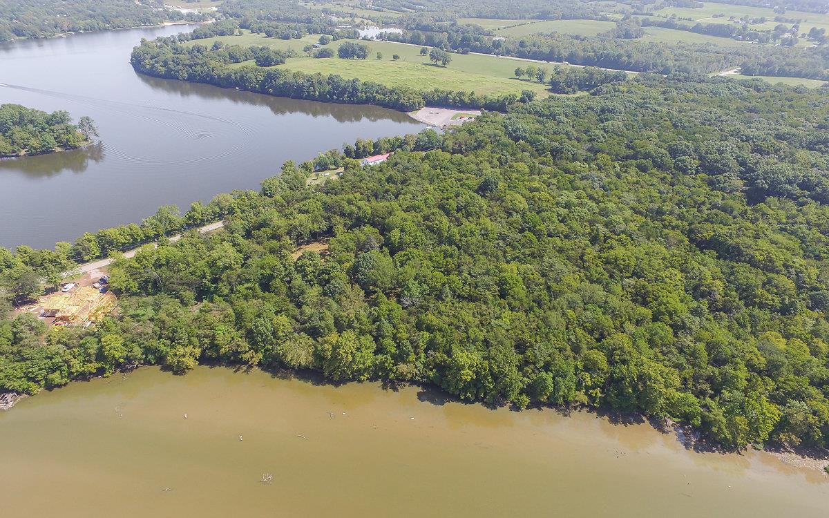 0 Burton Road Mount Juliet, TN 37122 - Photo 17 of 22 a view of a lake with a yard