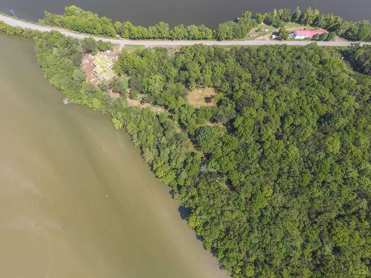 0 Burton Road Mount Juliet, TN 37122 - Photo 22 of 22 a view of a lake with a yard