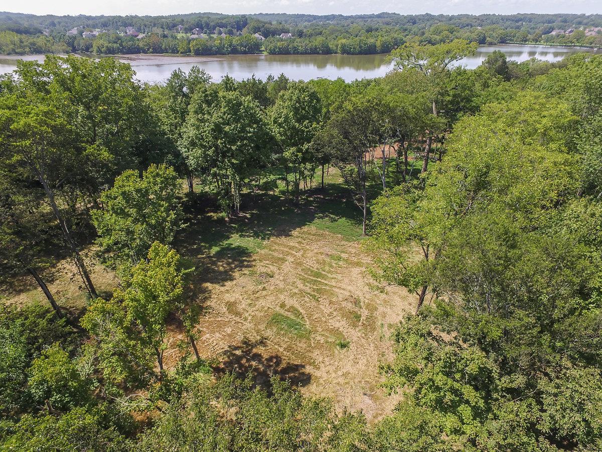 0 Burton Road Mount Juliet, TN 37122 - Photo 4 of 22 a view of a lake with mountains in the background