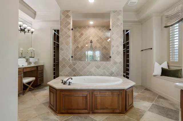 a bathroom with a tub and a sink