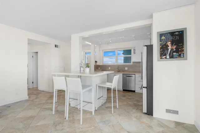 a view of a dining room with furniture