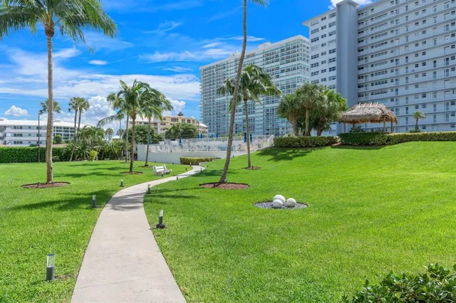 a view of outdoor space yard swimming pool and dining room