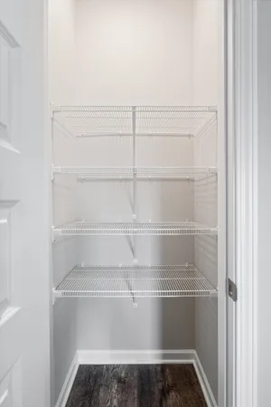 a view of a room with rack on the wall