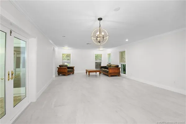 a view of a kitchen with a refrigerator and microwave