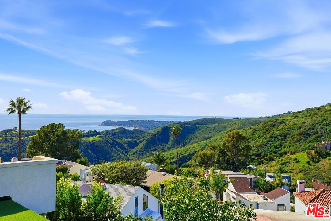 2955 Corral Canyon Road Malibu, CA 90265 - Photo 16 of 21 a view of a lake with a yard