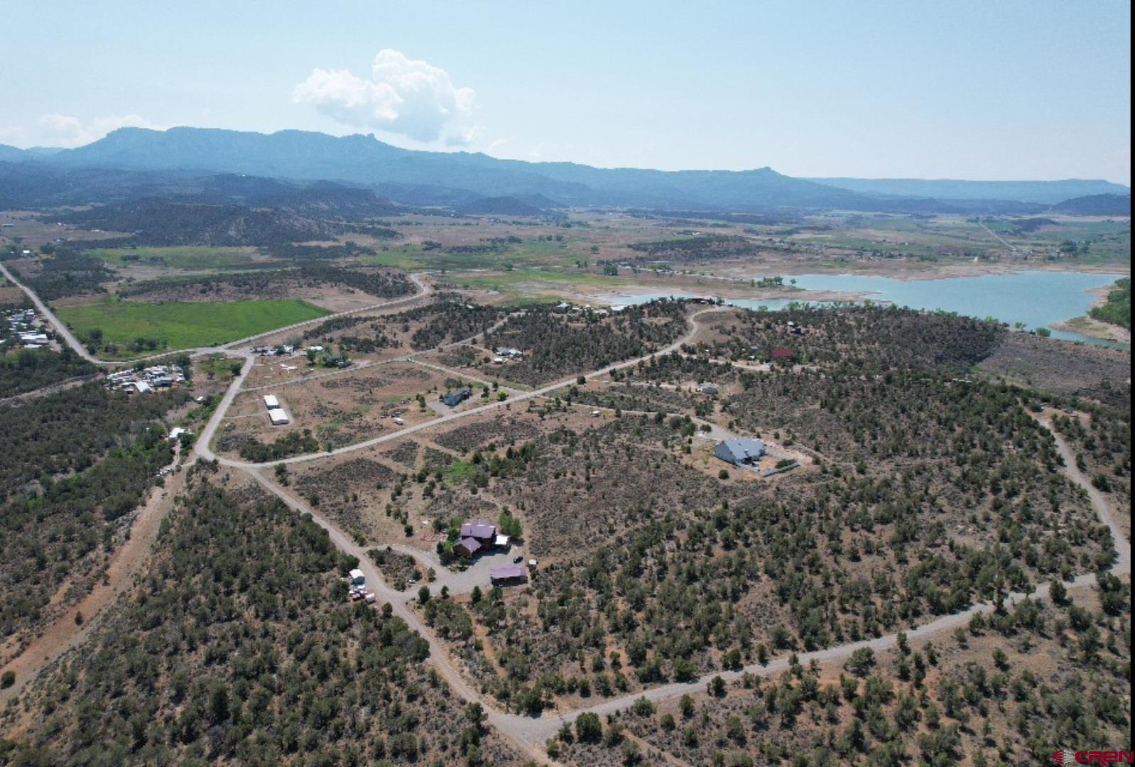 Lot 8 D Road Crawford, CO 81415 - Photo 4 of 18 a view of a city with mountains in the background