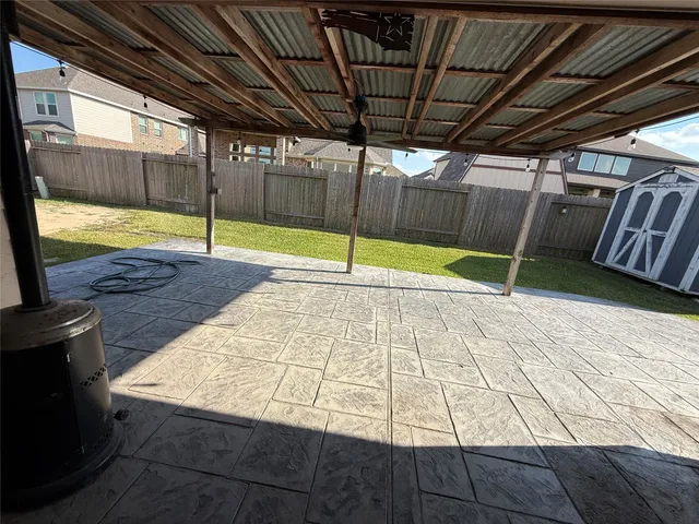 a view of a backyard of a house