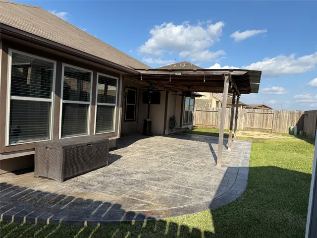 a house view with swimming pool and porch