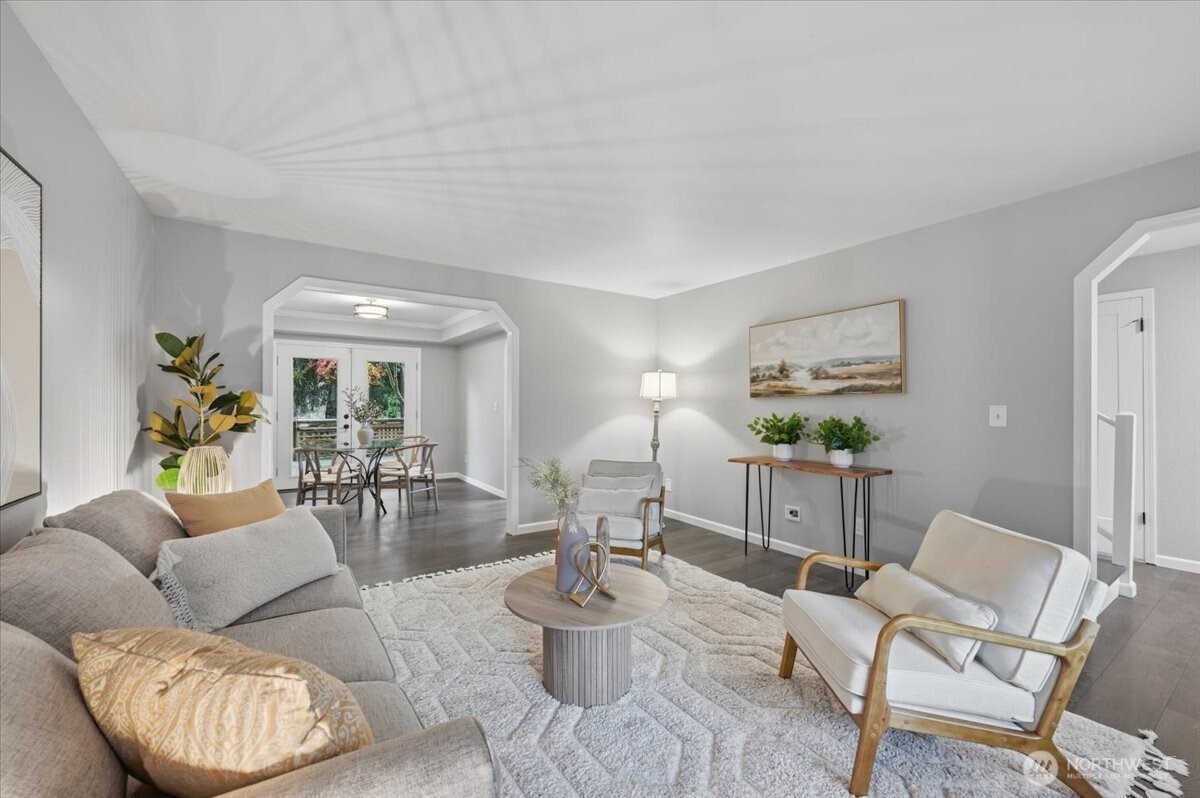 13802 60th Avenue West Edmonds, WA 98026 - Photo 11 of 36 a living room with furniture and a wooden floor