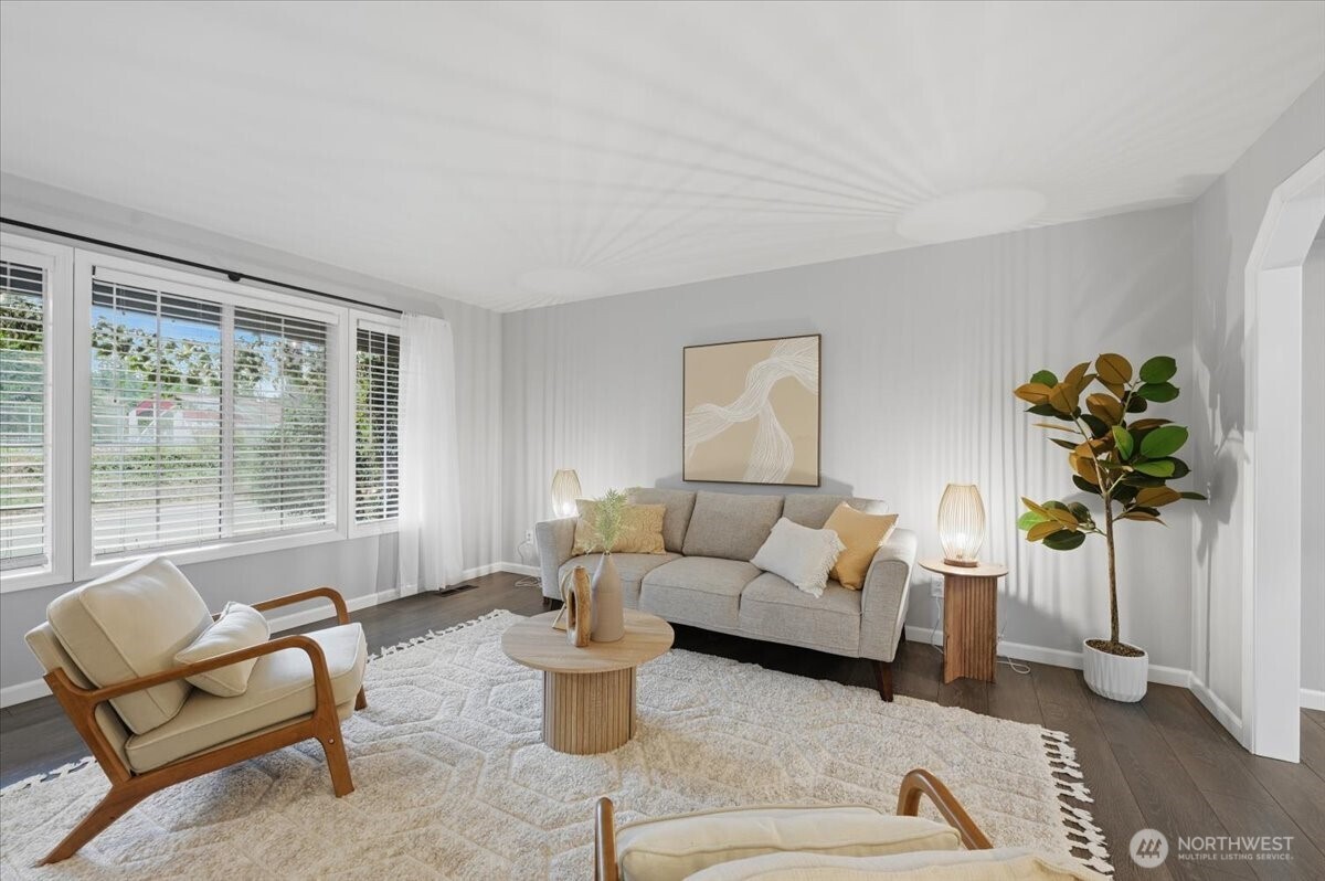 13802 60th Avenue West Edmonds, WA 98026 - Photo 12 of 36 a living room with furniture and a window