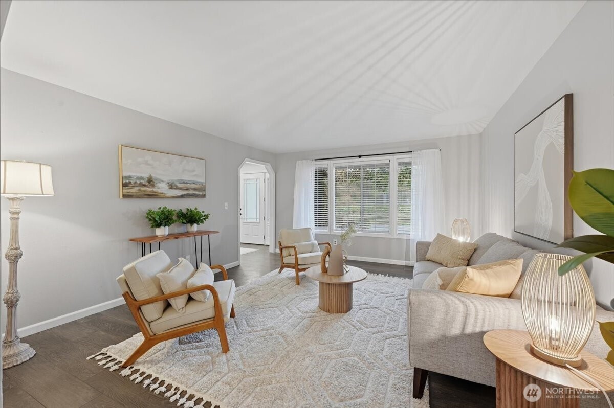 13802 60th Avenue West Edmonds, WA 98026 - Photo 13 of 36 a living room with furniture and a window