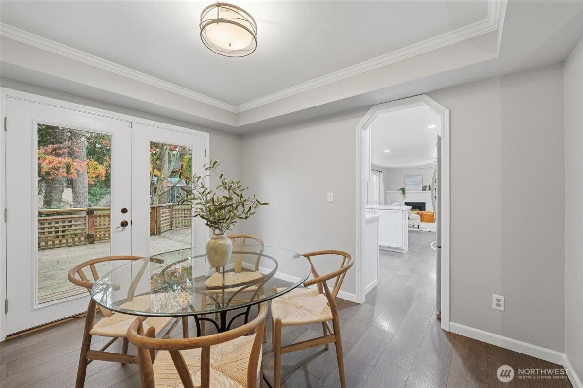 13802 60th Avenue West Edmonds, WA 98026 - Photo 14 of 36 a view of a dining room with furniture window and wooden floor