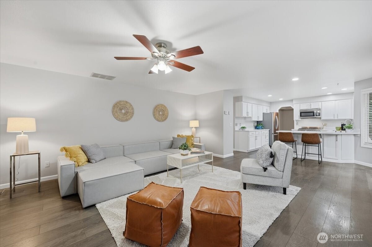 13802 60th Avenue West Edmonds, WA 98026 - Photo 18 of 36 a living room with furniture and kitchen view