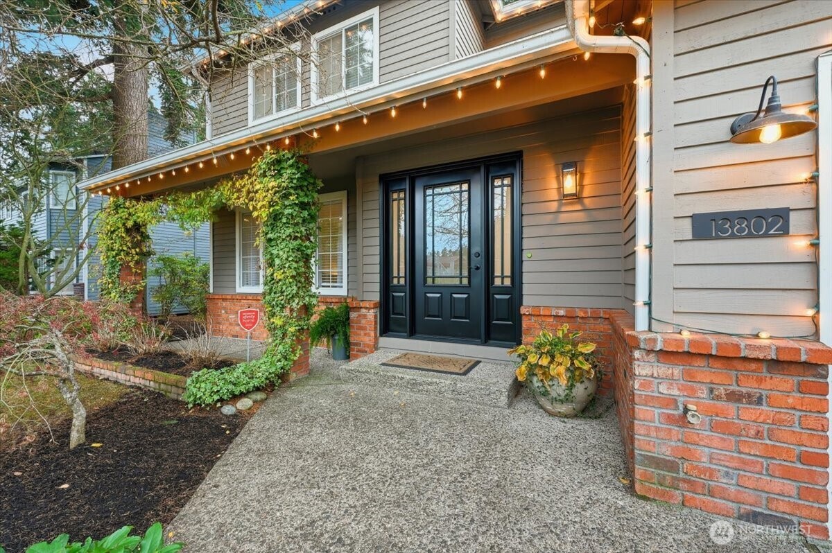 13802 60th Avenue West Edmonds, WA 98026 - Photo 2 of 36 a front view of a house with garden