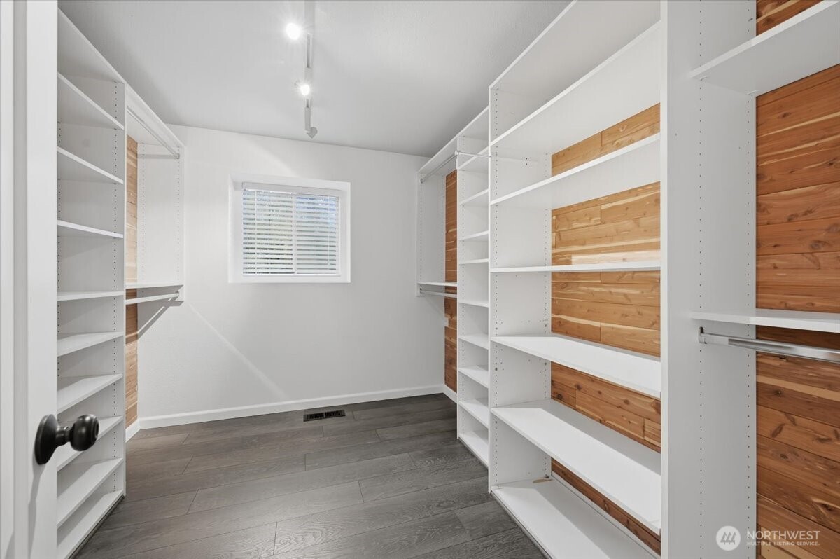 13802 60th Avenue West Edmonds, WA 98026 - Photo 21 of 36 a view of walk in closet with empty racks