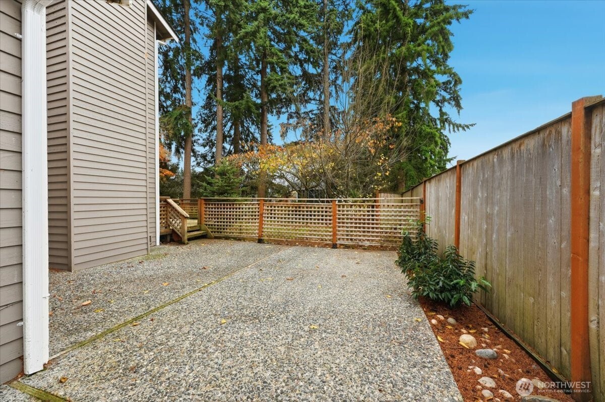 13802 60th Avenue West Edmonds, WA 98026 - Photo 28 of 36 a view of backyard and tree