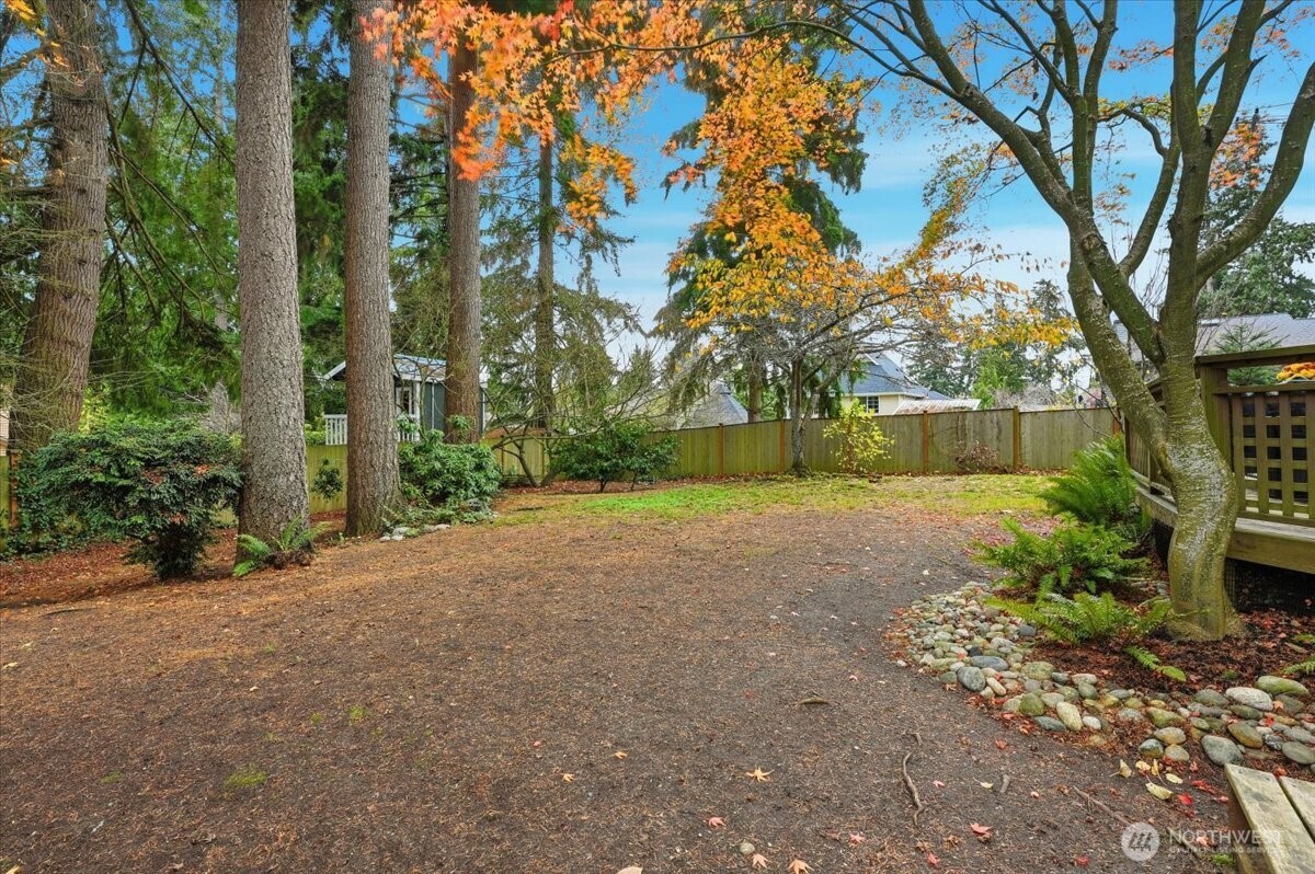 13802 60th Avenue West Edmonds, WA 98026 - Photo 10 of 36 a view of a house with backyard and garden