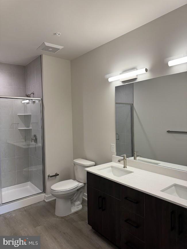 26 South York Road, Unit 103 Hatboro, PA 19040 - Photo 11 of 49 a bathroom with a sink toilet and shower