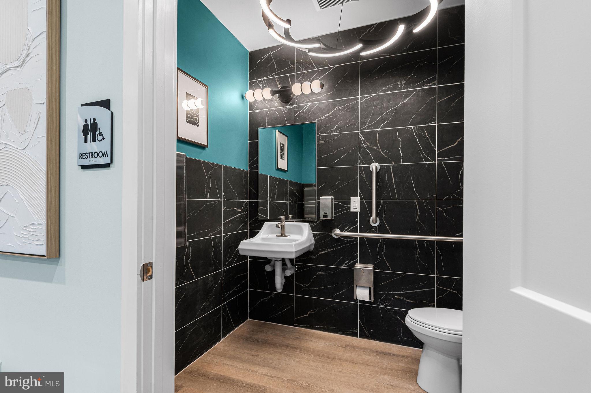 26 South York Road, Unit 103 Hatboro, PA 19040 - Photo 23 of 49 a bathroom with a toilet