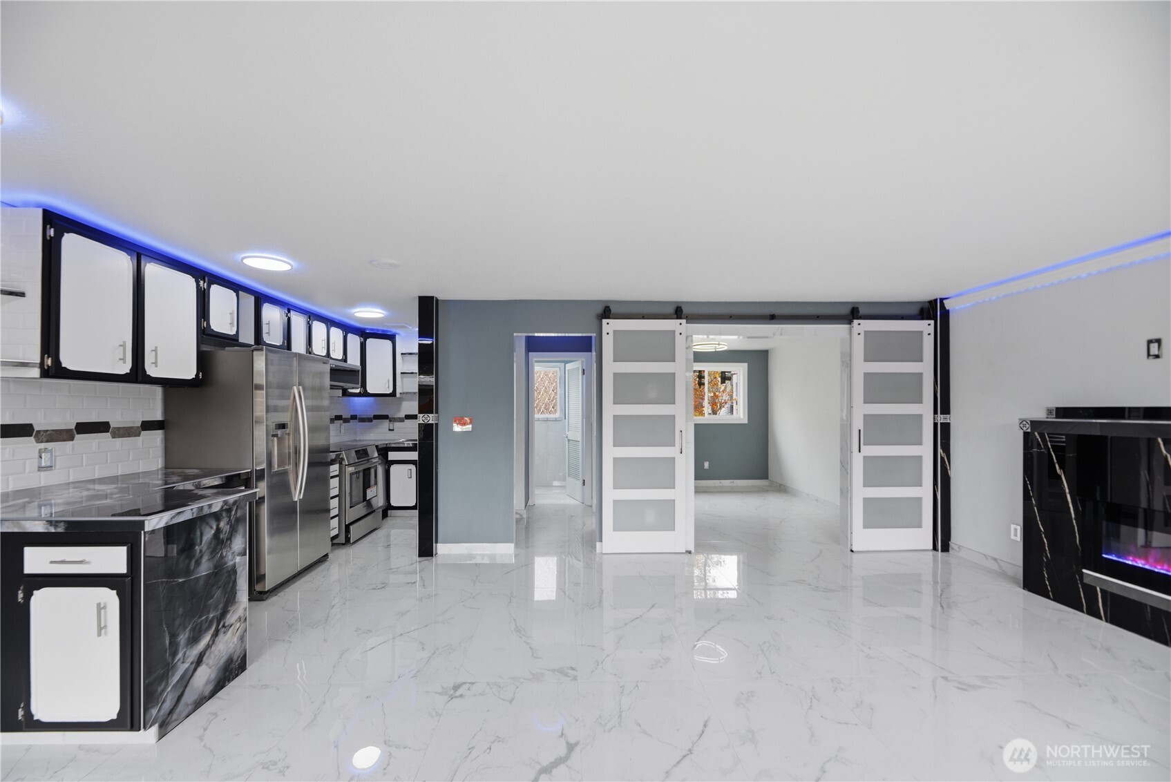 748 South Cloverdale Street, Unit 8 Seattle, WA 98108 - Photo 18 of 30 a view of a livingroom with furniture and an empty room