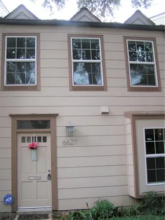 a front view of a house with windows
