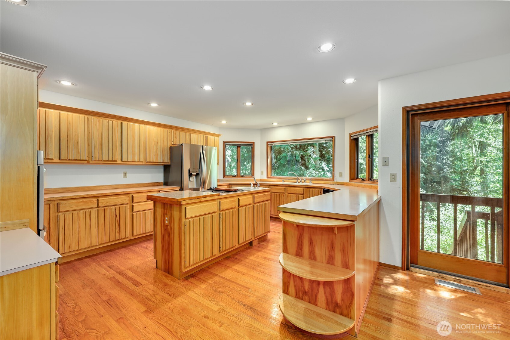 11 Bishop Hill Road Chimacum, WA 98325 - Photo 12 of 34 a kitchen with stainless steel appliances granite countertop a stove a sink and a refrigerator