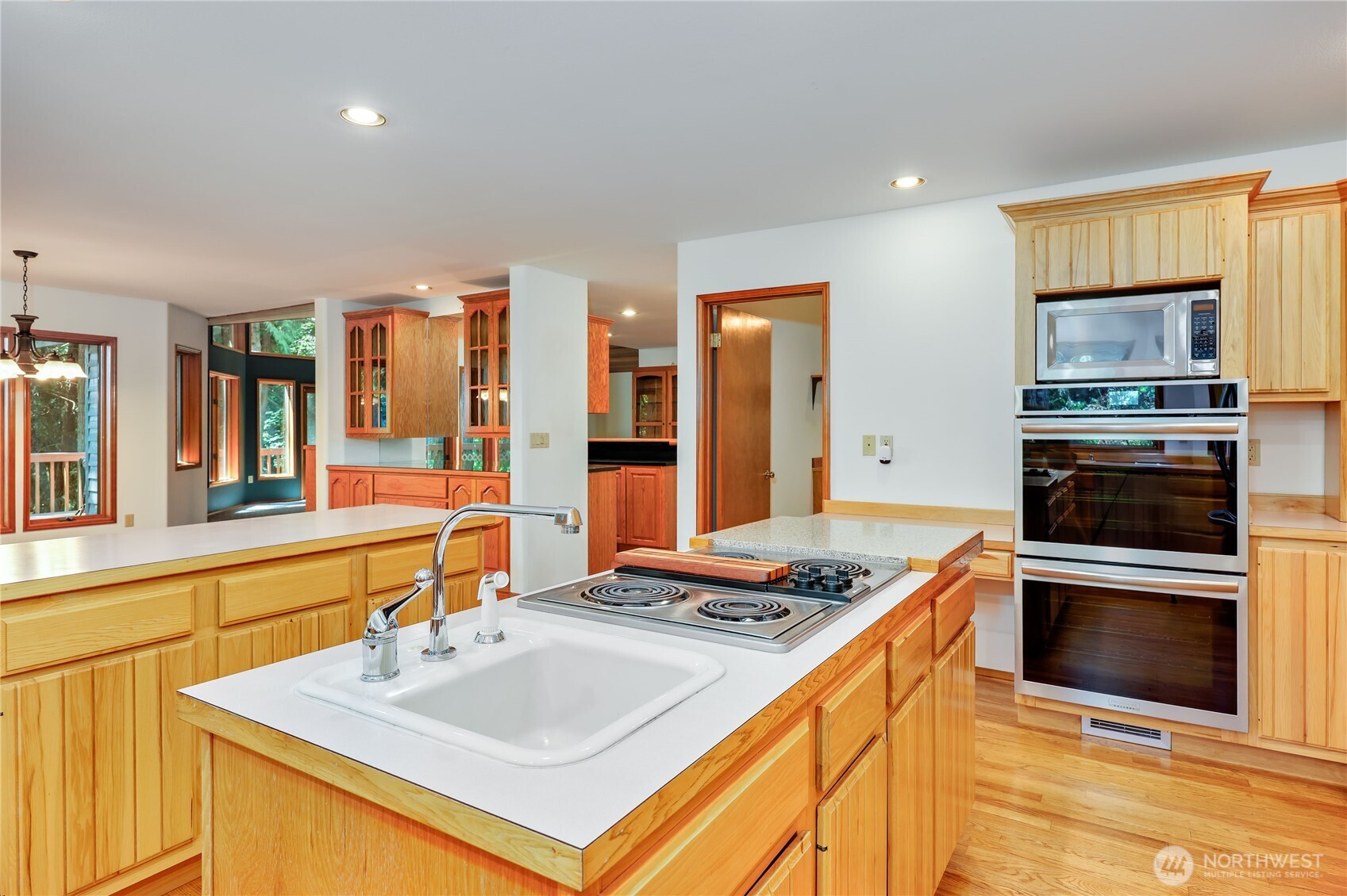 11 Bishop Hill Road Chimacum, WA 98325 - Photo 14 of 34 a kitchen with stainless steel appliances granite countertop a sink stove and refrigerator
