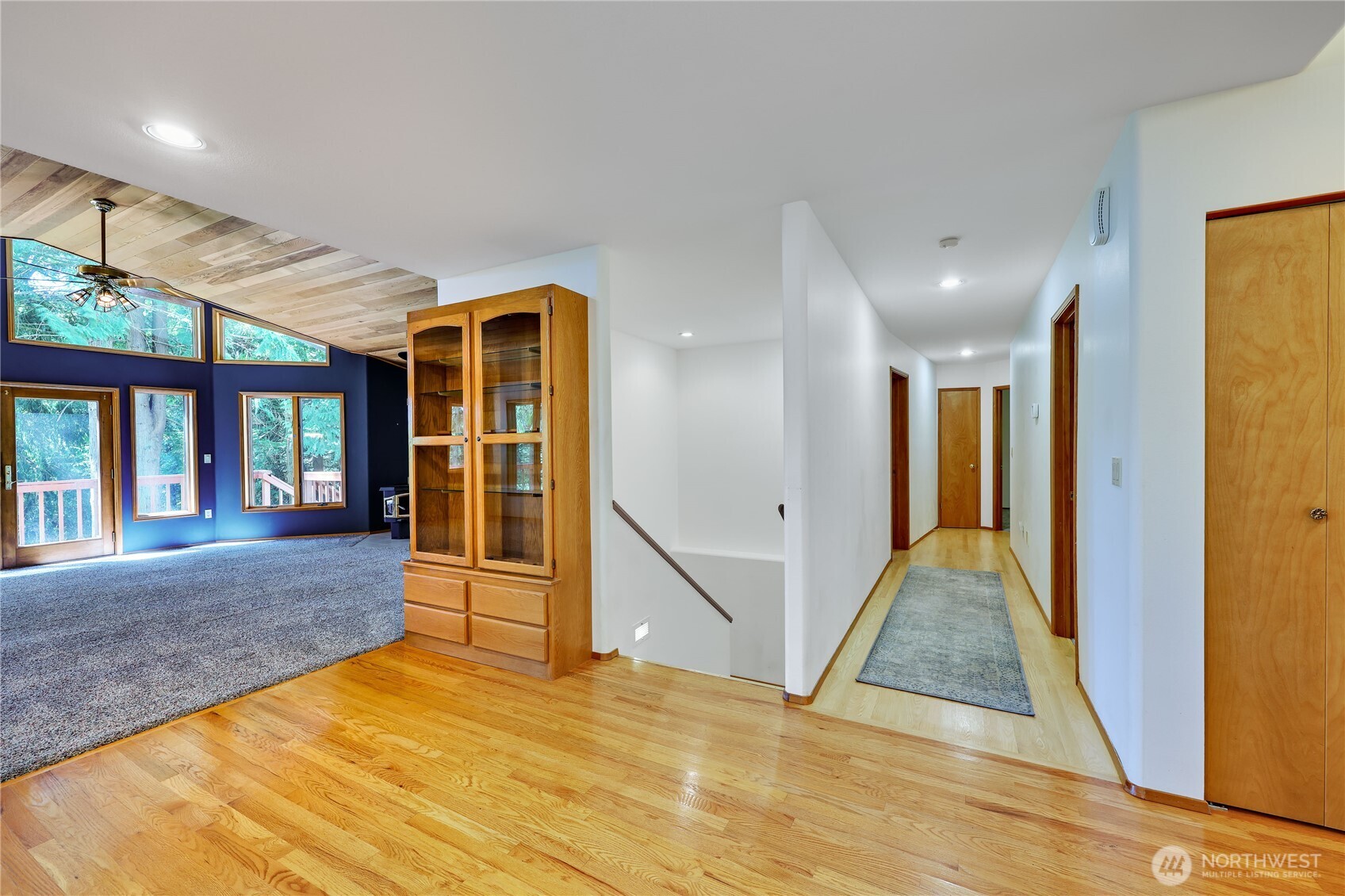 11 Bishop Hill Road Chimacum, WA 98325 - Photo 16 of 34 a view of an empty room with window and wooden floor