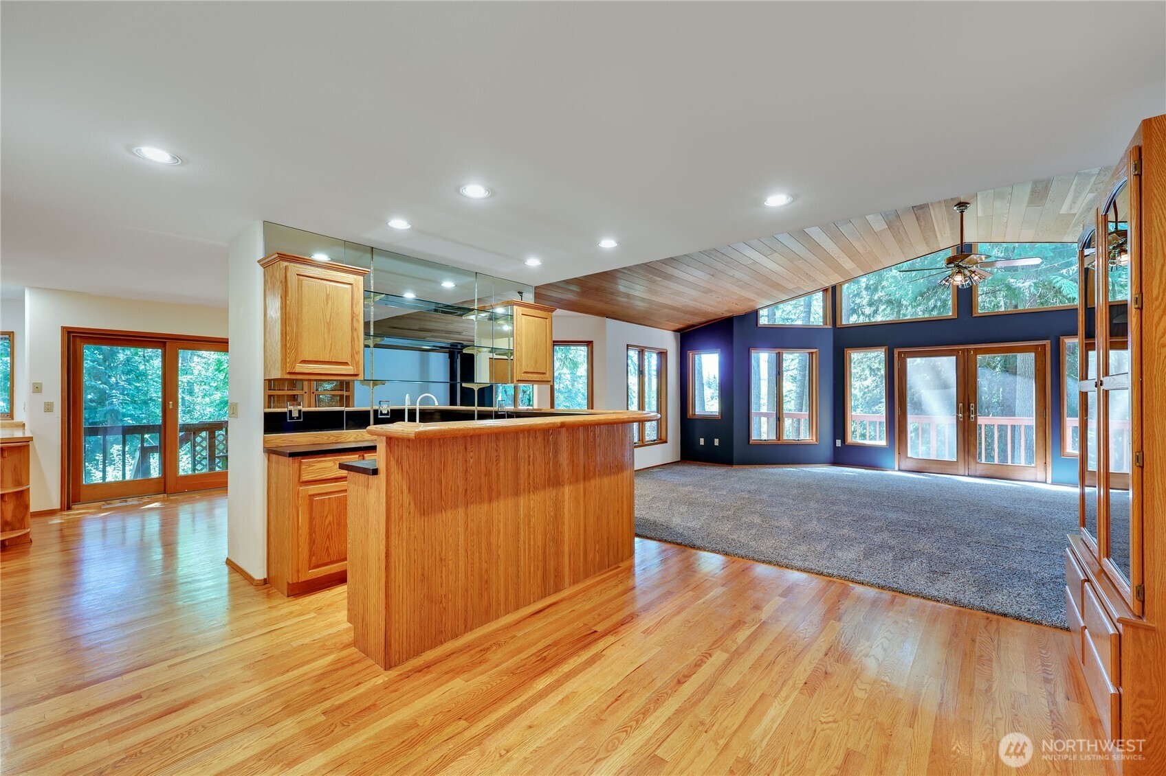 11 Bishop Hill Road Chimacum, WA 98325 - Photo 5 of 34 a large kitchen with stainless steel appliances granite countertop a refrigerator a stove and a wooden floors